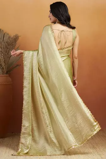 Green plain tissue festive wear saree with blouse piece