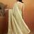 Green plain tissue festive wear saree with blouse piece