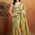 Green plain tissue festive wear saree with blouse piece