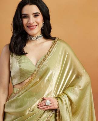 Green plain tissue festive wear saree with blouse piece 5