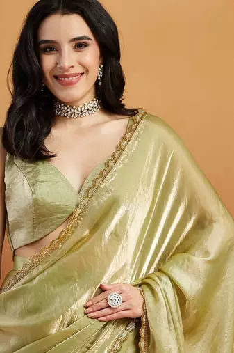 Green plain tissue festive wear saree with blouse piece