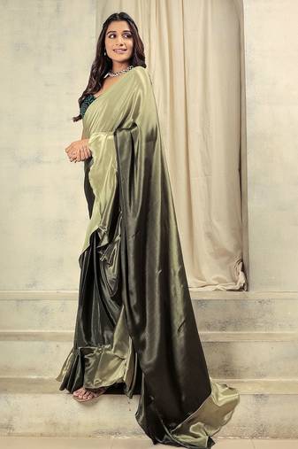 Green plain silk blend party wear saree with blouse piece