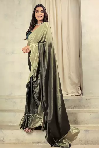 Green plain silk blend party wear saree with blouse piece
