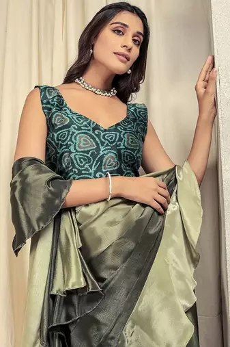 Green plain silk blend party wear saree with blouse piece