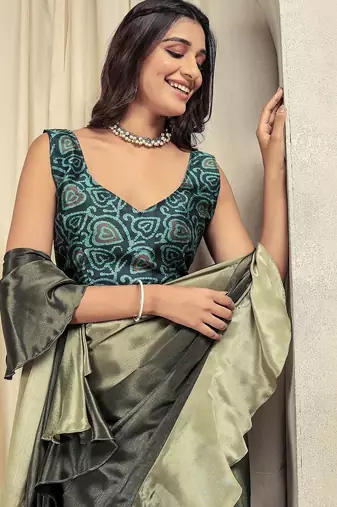 Green plain silk blend party wear saree with blouse piece
