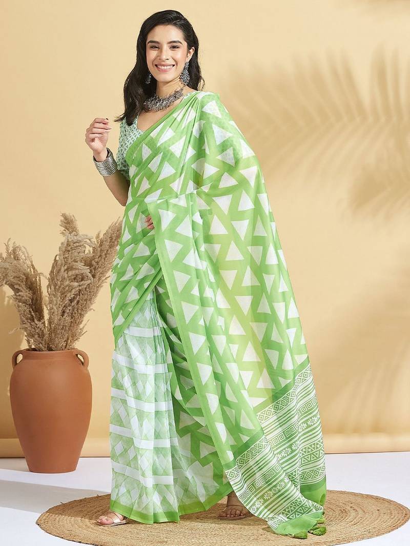 Green printed blended cotton designer saree with blouse piece