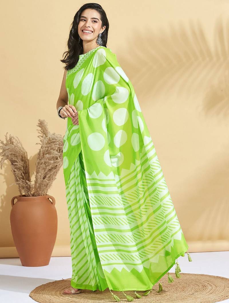 Green printed blended cotton designer saree with blouse piece