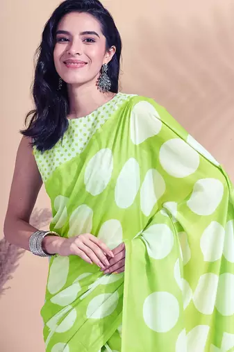 Green printed blended cotton designer saree with blouse piece