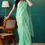 Green elegant printed organza saree with blouse piece