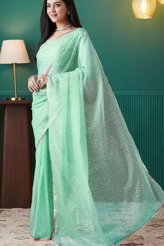 Green elegant printed organza saree with blouse piece