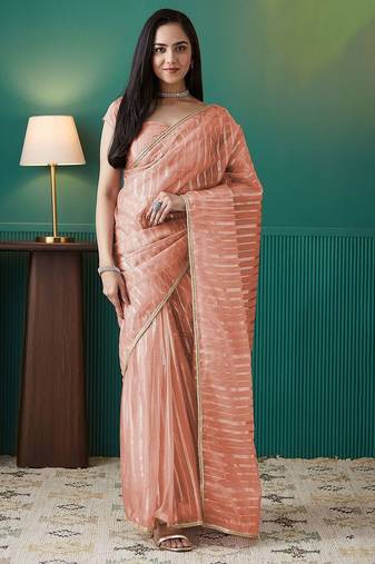Peach elegant printed organza saree with blouse piece