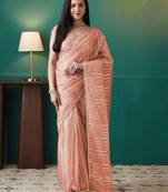 Peach elegant printed organza saree with blouse piece