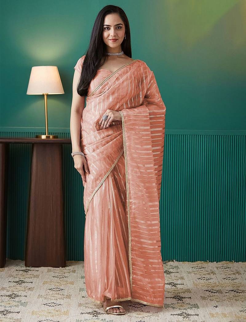 Peach elegant printed organza saree with blouse piece