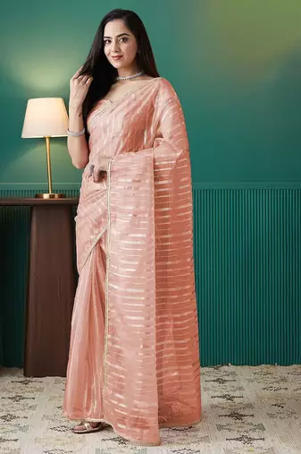Peach elegant printed organza saree with blouse piece