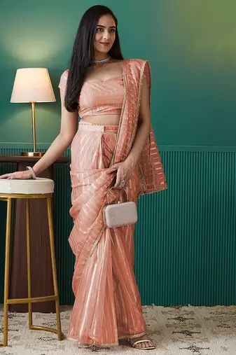 Peach elegant printed organza saree with blouse piece
