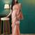 Peach elegant printed organza saree with blouse piece