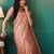 Peach elegant printed organza saree with blouse piece