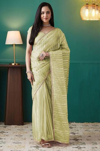 Green elegant printed organza saree with blouse piece
