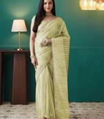 Green elegant printed organza saree with blouse piece