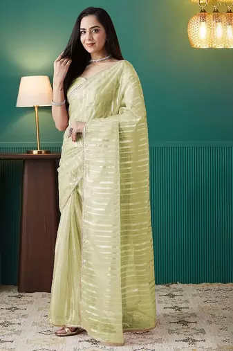 Green elegant printed organza saree with blouse piece