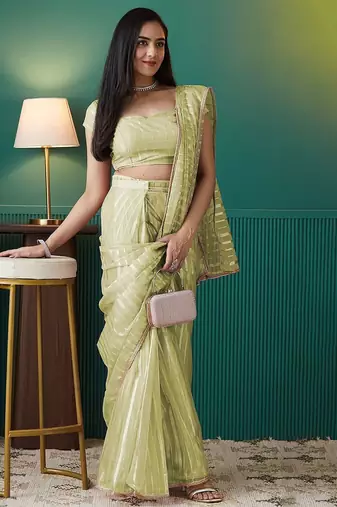 Green elegant printed organza saree with blouse piece