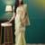 Green elegant printed organza saree with blouse piece