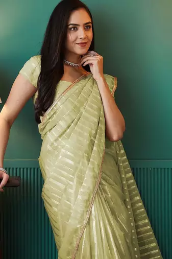 Green elegant printed organza saree with blouse piece