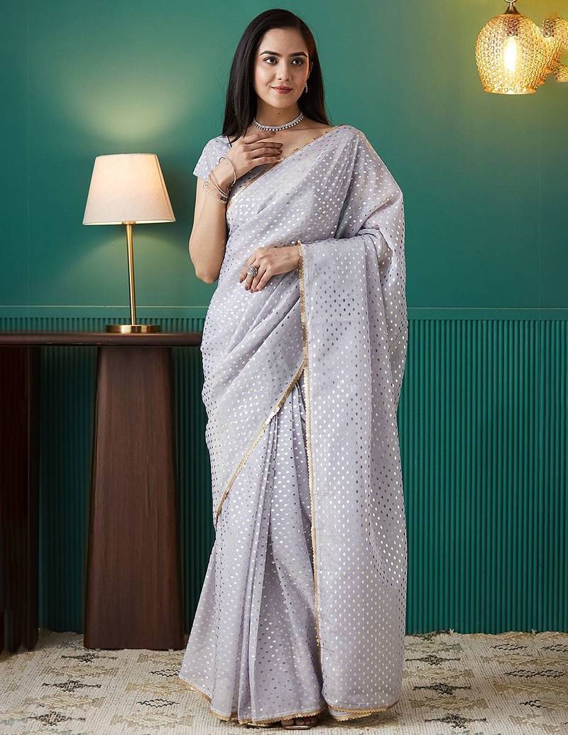 Purple elegant printed organza saree with blouse piece