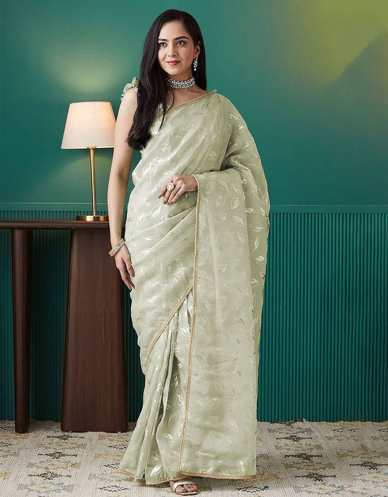 Green elegant printed organza saree with blouse piece