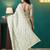 Green elegant printed organza saree with blouse piece