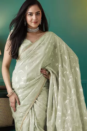 Green elegant printed organza saree with blouse piece
