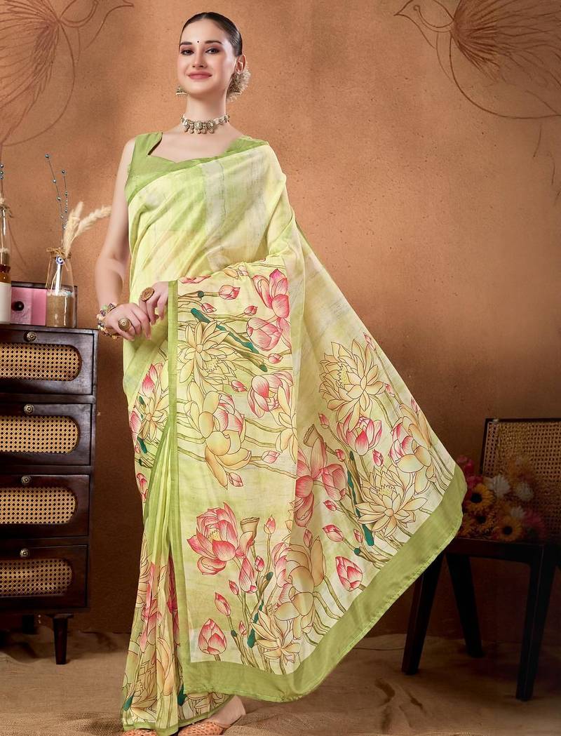 Green elegant printed organza saree with blouse piece