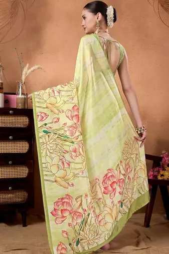 Green elegant printed organza saree with blouse piece