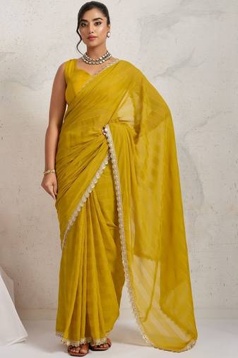 Yellow elegant printed georgette saree with blouse piece