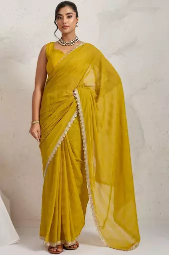 Yellow elegant printed georgette saree with blouse piece
