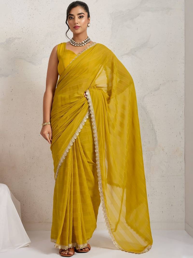Yellow elegant printed georgette saree with blouse piece