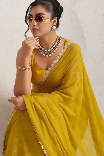 Yellow elegant printed georgette saree with blouse piece