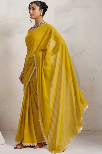 Yellow elegant printed georgette saree with blouse piece