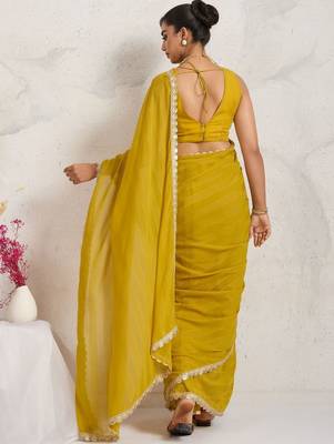 Yellow elegant printed georgette saree with blouse piece 4