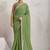 Green printed pure georgette casual saree with blouse piece