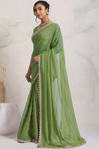 Green printed pure georgette casual saree with blouse piece