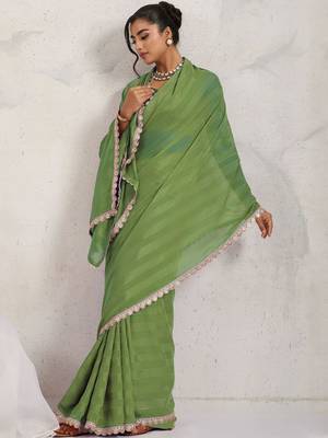 Green printed pure georgette casual saree with blouse piece 4