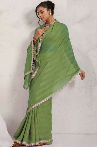 Green printed pure georgette casual saree with blouse piece