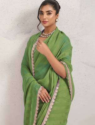 Green printed pure georgette casual saree with blouse piece 5