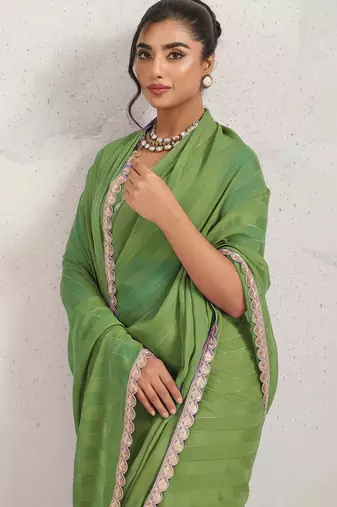 Green printed pure georgette casual saree with blouse piece