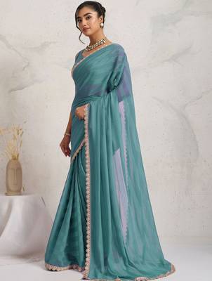 Teal elegant printed georgette saree with blouse piece 3