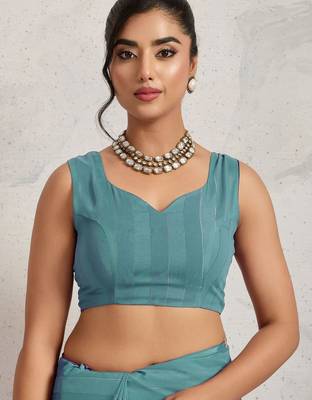 Teal elegant printed georgette saree with blouse piece 5