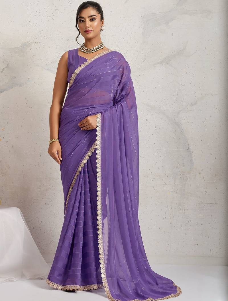 Purple elegant printed georgette saree with blouse piece