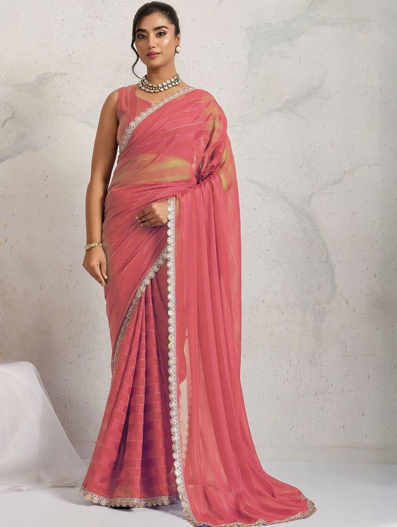 Red elegant printed georgette saree with blouse piece