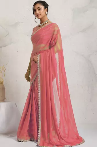 Red elegant printed georgette saree with blouse piece